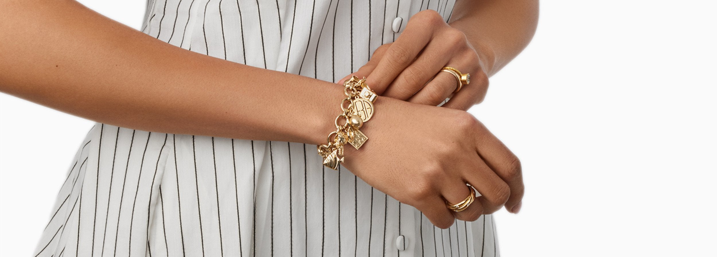 mom proudly wearing new Mother's Day charm bracelet